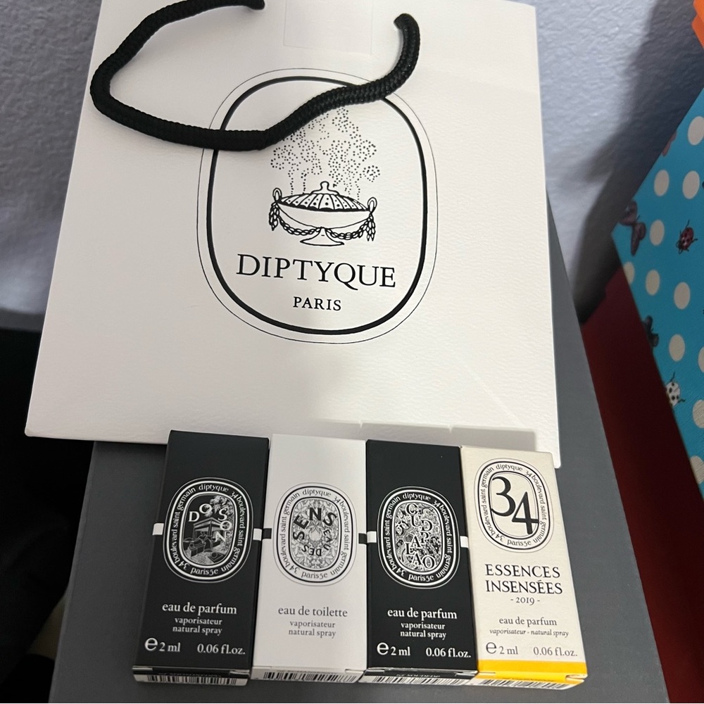 Diptyque perfume samples and shopping bag